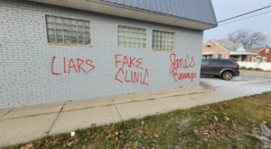 Spraypaint on the side of Pregnancy Aid Detroit in Eastpointe reads "Liars", "Fake Clinic", and "Jane's Revenge"